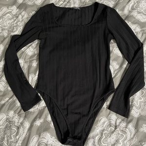 Black ribbed body suit